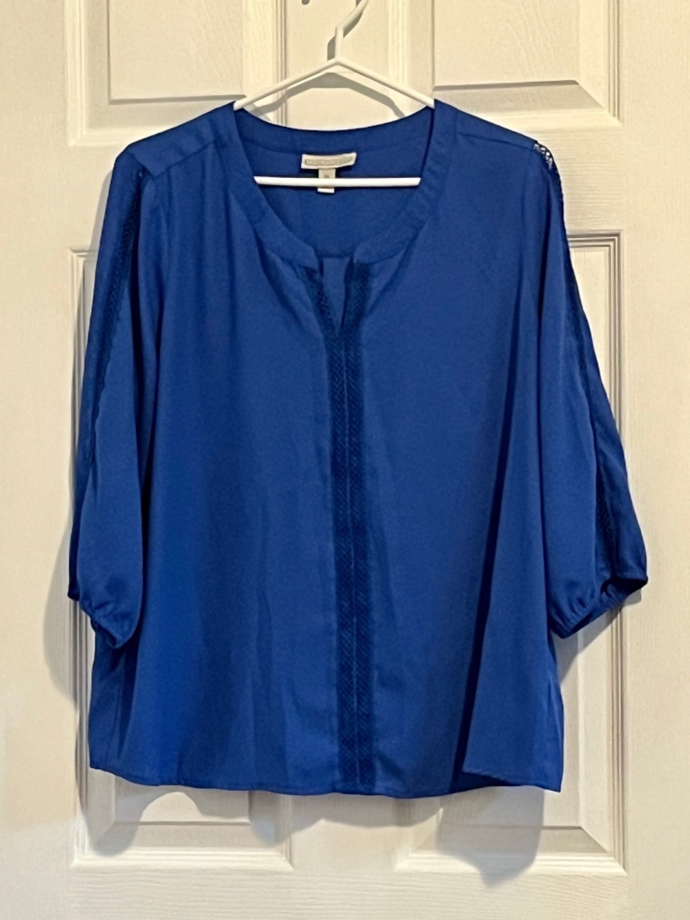 Blue light weight blouse with eyelet stitching details